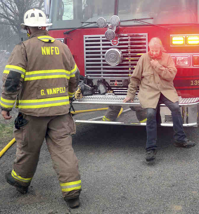 Lynn Palmer and her husband lost another home to fire. A couple who lost their home in January to fire have now lost the barn, which they recently have been living in.   (Patricia Schaeffer / The (Lisbon) Morning Journal)